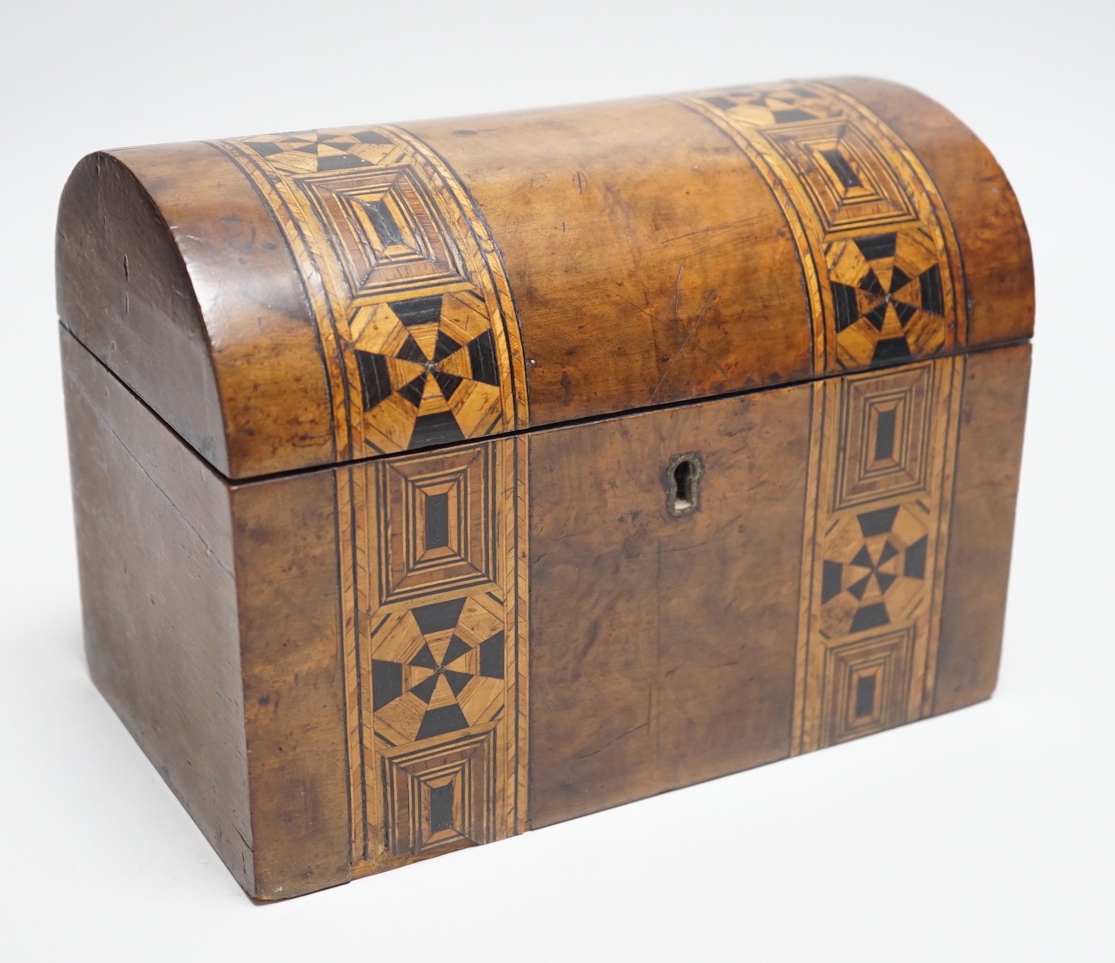 A Victorian burr walnut inset tea caddy, 20 cm wide, the lids with bone knobs